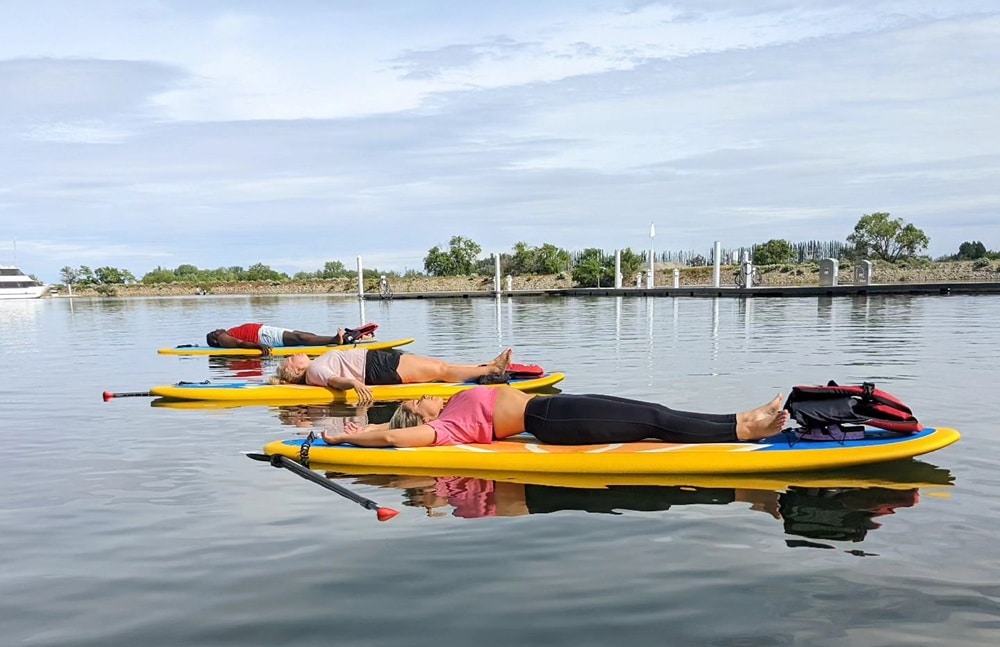 anchoring a paddleboard on the river